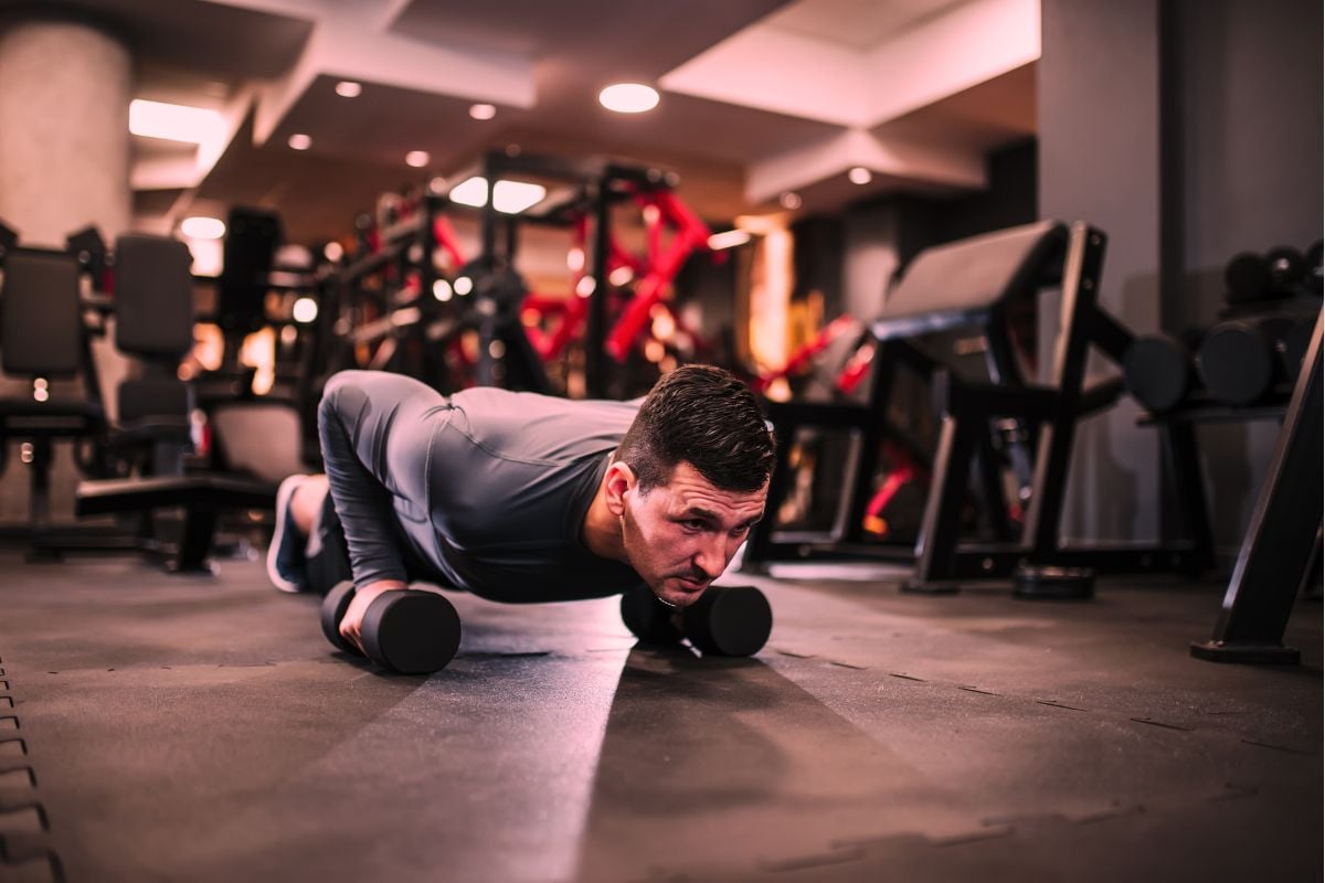 6 Best Lower Chest Dumbbell Exercises to Build Burliest Pecs Deficit Pushup is one of the best dumbbell chest workouts that require no bench