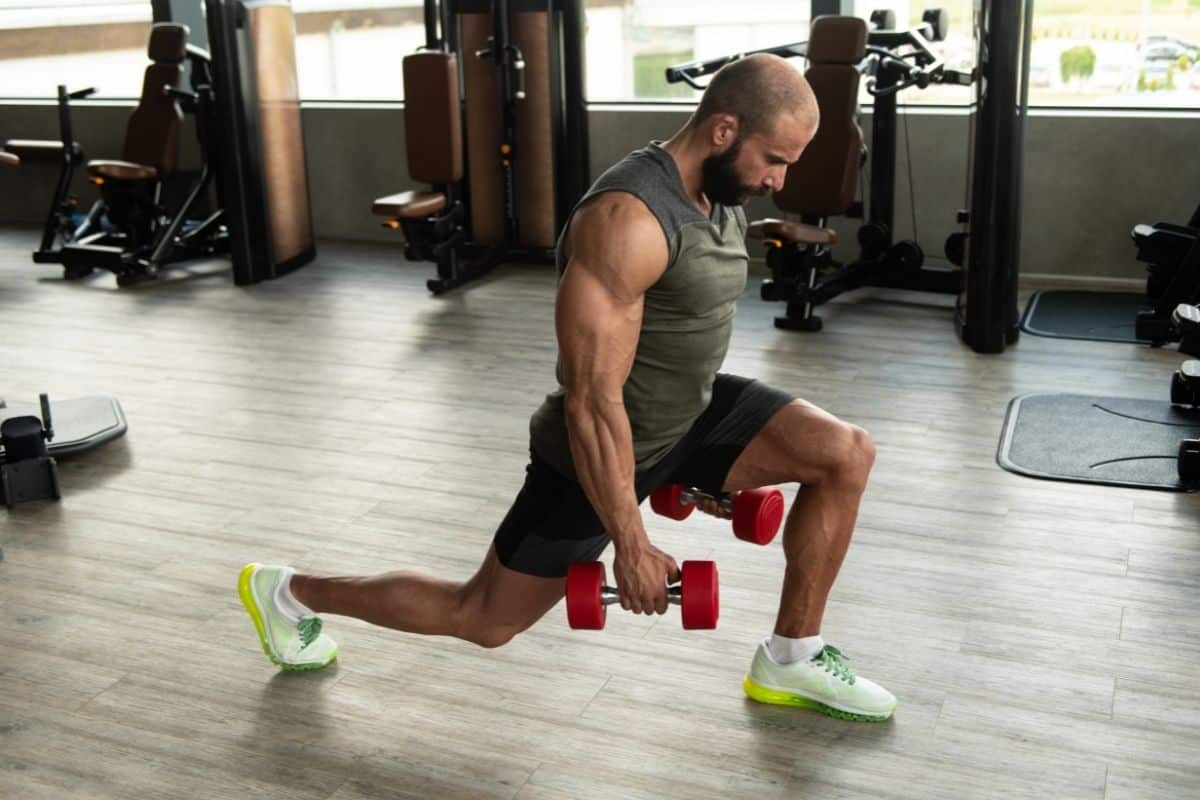 10 Best Dumbbell Quad Exercises for Firm and Toned Legs Dumbbell Lunge Workout For Strong Quad