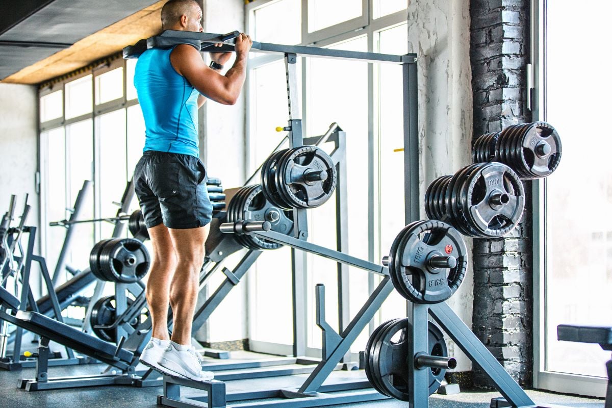 11 Best Calf Raise Variations for Strength and Mass Machine Standing Calf Raises