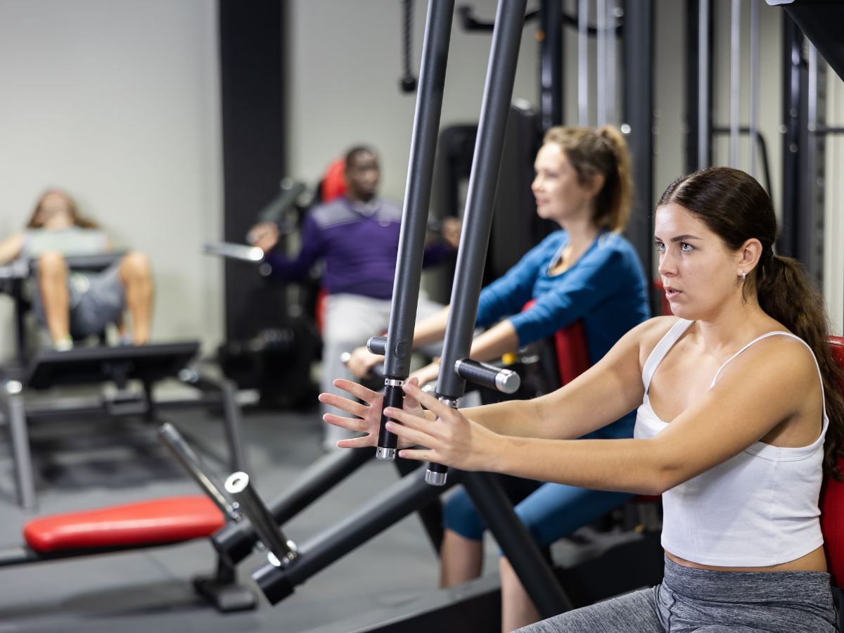 Seated Pec Deck Fly, an isolation chest exercise.