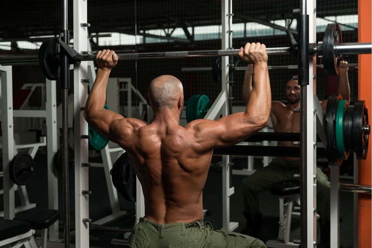6 Best Overhead Press Variations & Their Benefits Smith Machine Overhead Press